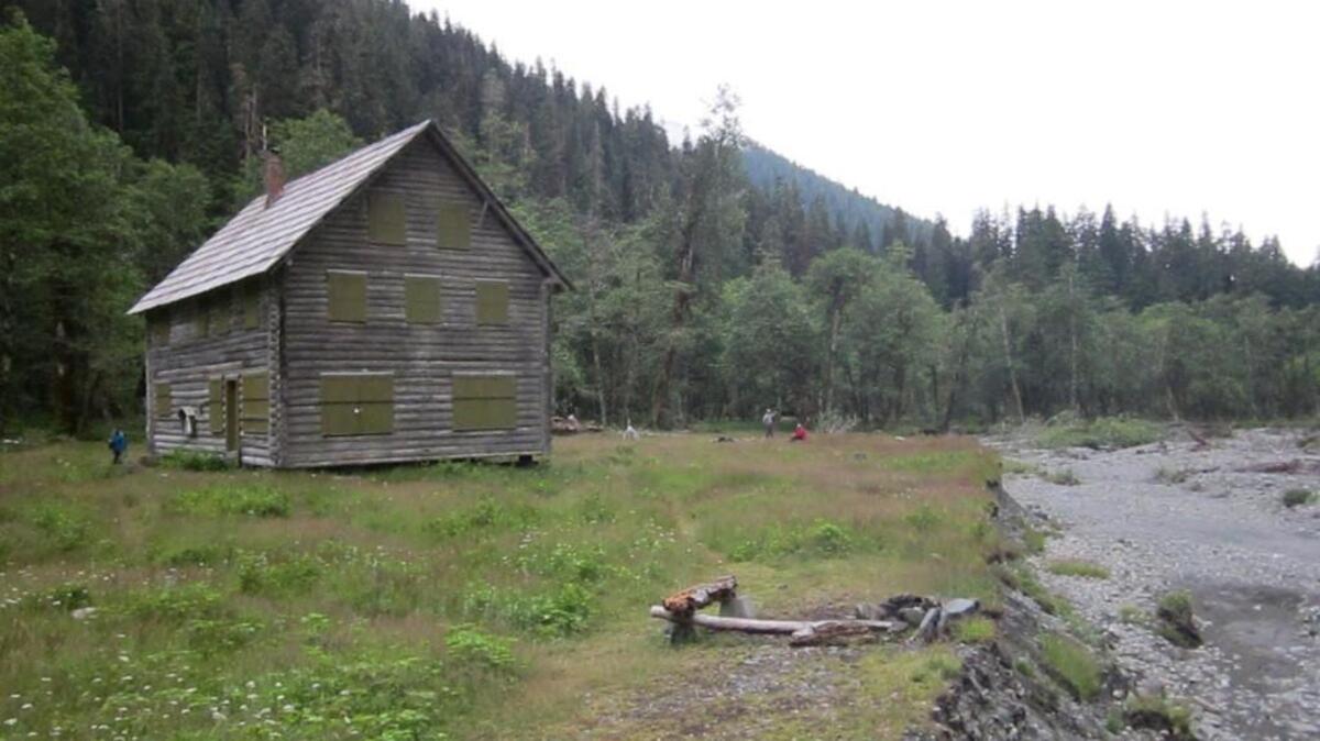This photo, taken July 10, shows the Enchanted Valley Chalet sitting near the bank of a channel of the East Fork Quinault River in Olympic National Park.
