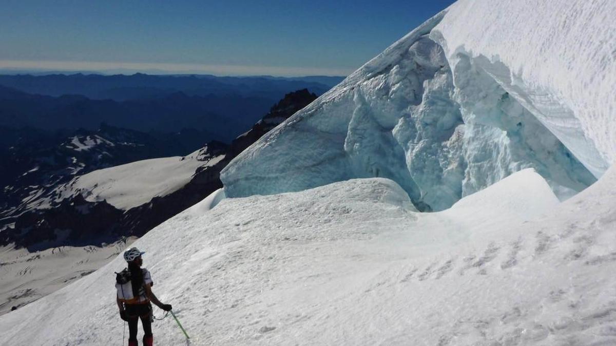 Ras Vaughn navigates the tricky upper slopes of Mount Rainier during a late July trip during which he and Gavin Woody climbed Rainier twice and ran the Wonderland Trail. They finished the Infinity Loop in 99 hours, 7 minutes.