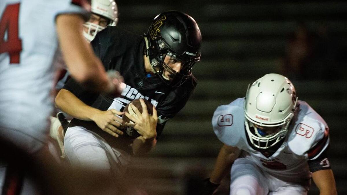 Lincoln’s Caden Filer (6) scrambles in the third quarter. Lincoln High School played Camas High School in a football game at the Lincoln Bowl in Tacoma, Wash., on Friday, Aug. 31, 2018.