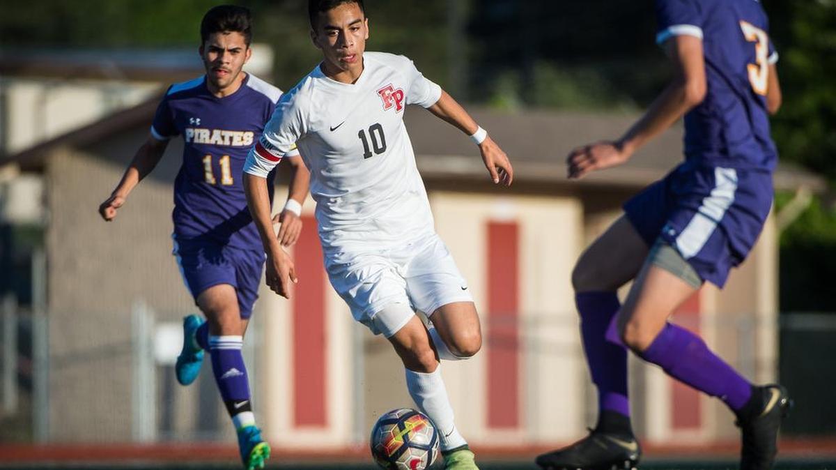 Franklin Pierce’s Gilbert De La Luz (10) moves the ball up the field in the first half. Franklin Pierce played Highline in a soccer match at Franklin Pierce High School in Tacoma, Wash., on Saturday, May 12, 2018.