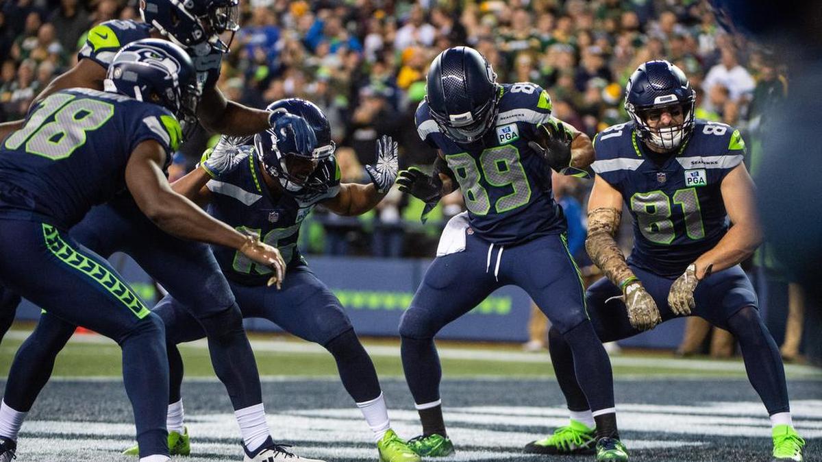 Seahawks players celebrate a touchdown catch by Seahawks wide receiver Doug Baldwin in the second quarter. The Seattle Seahawks played the Green Bay Packers in a NFL football game at CenturyLink Field in Seattle, Wash., on Thursday, Nov. 15, 2018.