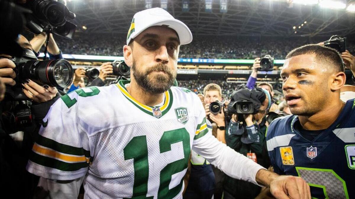 Packers quarterback Aaron Rodgers and Seahawks quarterback Russell Wilson meet after the game. The Seattle Seahawks played the Green Bay Packers in a NFL football game at CenturyLink Field in Seattle, Wash., on Thursday, Nov. 15, 2018.
