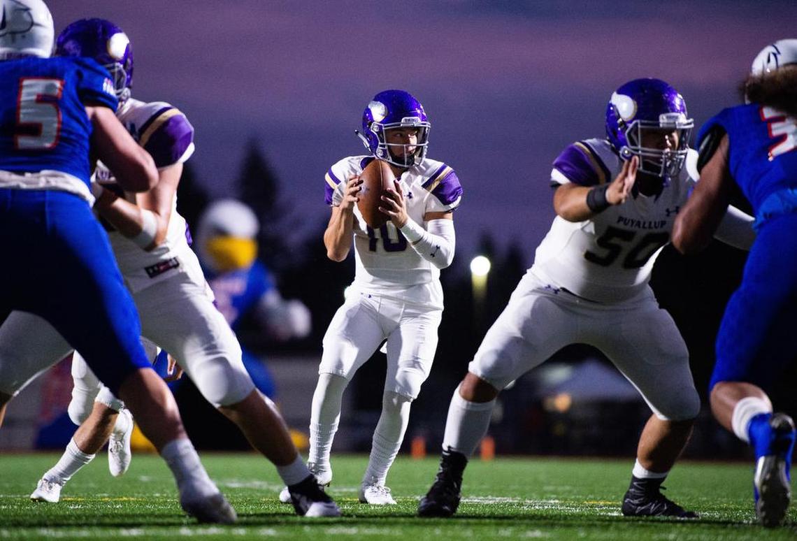 Puyallup’s Jacob Holcomb (10) looks to pass. Graham-Kapowsin played Puyallup in a football game at Art Crate Field in Spanaway, Wash., on Friday, Sept. 21, 2018.