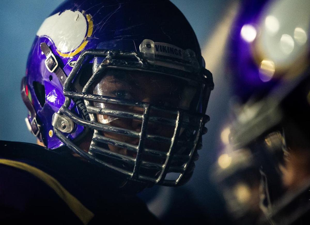 Puyallup’s Dave Iuli (74) prepares to get Puyallup players pumped before the game. Puyallup High School played Kennedy Catholic High School in a football game at Sparks Stadium in Puyallup, Wash., on Friday, Nov. 2, 2018.
