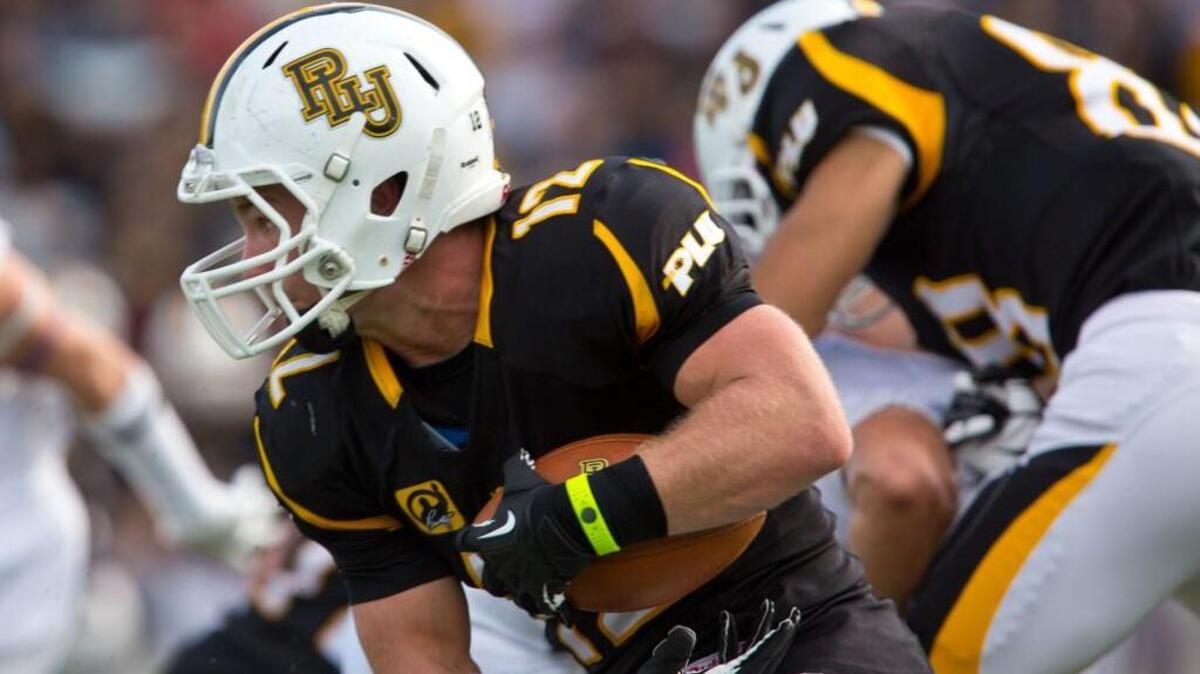 
Junior receiver Ben Welch (12) is the lone returning skill-position player on offense for the inexperienced Pacific Lutheran football team, which begins the season Saturday at Cal Lutheran.
