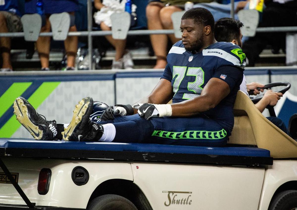 Seahawks offensive lineman Jamarco Jones is carted off the field after an injury in the fourth quarter. The Seattle Seahawks played the Indianapolis Colts in a NFL preseason game at CenturyLink Field in Seattle, Wash., on Thursday, Aug. 9, 2018.