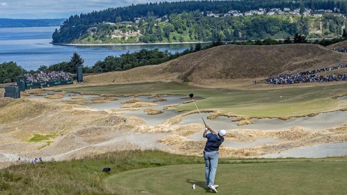 Jordan Spieth tees off with a sweeping view of Fox Island on the second day of the tournament at the 115th U.S. Open at Chambers Bay, Friday, June 19, 2015.