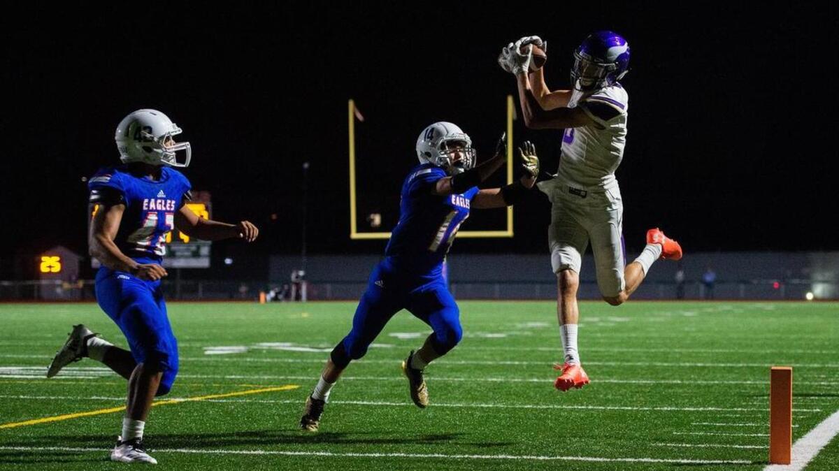 Puyallup’s Darius Morrison (18) pulls down a touchdown catch in the fourth quarter. Graham-Kapowsin played Puyallup in a football game at Art Crate Field in Spanaway, Wash., on Friday, Sept. 21, 2018.