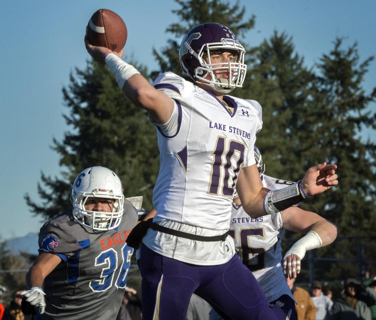 Lake Stevens quarterback Jacob Eason stands tall to complete a touchdown pass against Graham-Kapowsin at Art Crate Field on Saturday. The Vikings is one of the top college football recruits in the nation, but he’ll play his first game in the Tacoma Dome on Saturday night against Skyline.