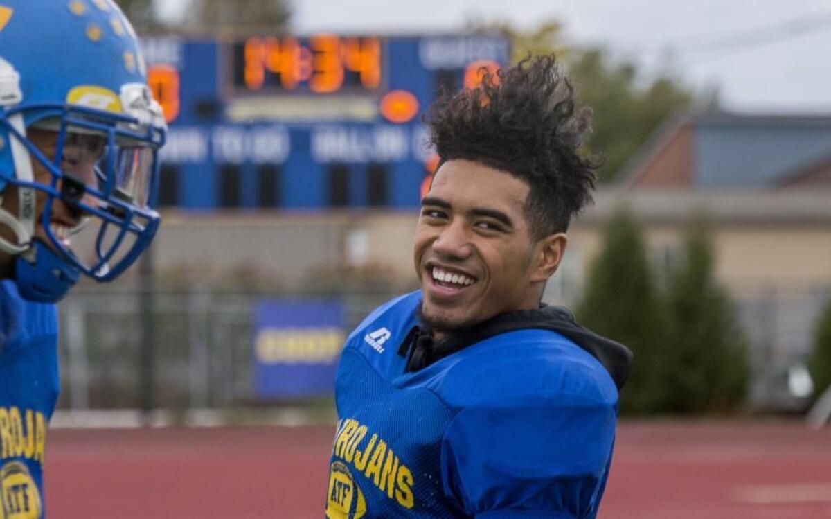 Falani Jennings, quarterback for Fife High School, at football practice, October 18, 2017. Asked about his haircut, teammates MJ Ale and Tomasi Puletu said it’s called “The Falani.”