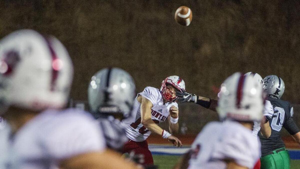 Quarterback Cale Millen of Mount Si High School throws in a football game against Kentwood at French Field in Kent, September 7, 2018. Mount Si dominated Kentwood.