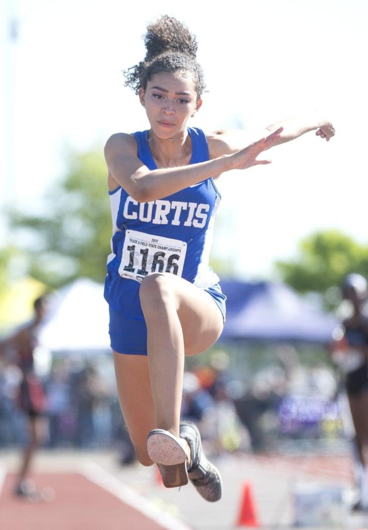 Curtis’ Lexi Ellis leaps to a state championship in the 4A girls triple jump during the opening day of the 2A-3A-4A Washington State Track & Field Meet at Mount Tahoma High School in Lakewood on Thursday, May 23, 2017.