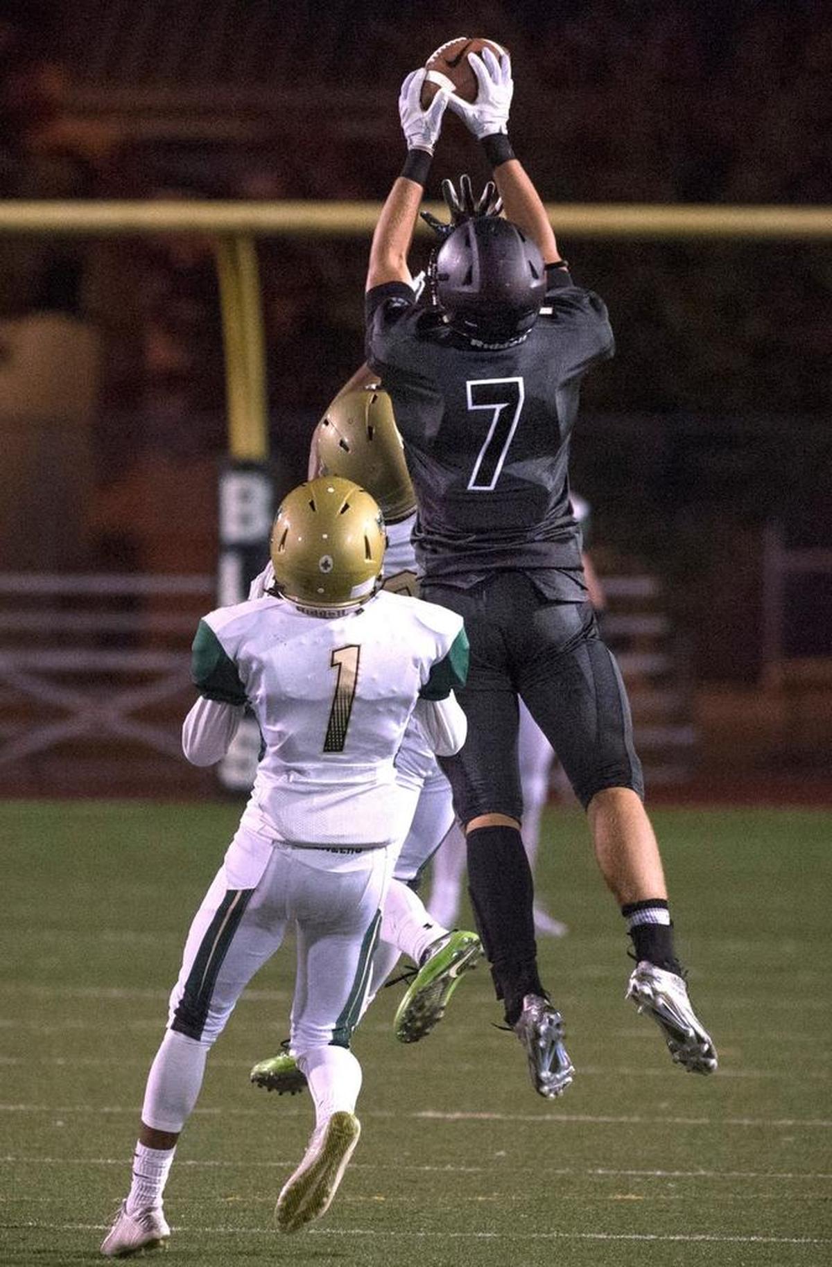 Bonney Lake wide receiver Adam Fahsel (7) pulls down a pass against Timberline on Sept. 9, 2016 at Sunset Stadium in Sumner.