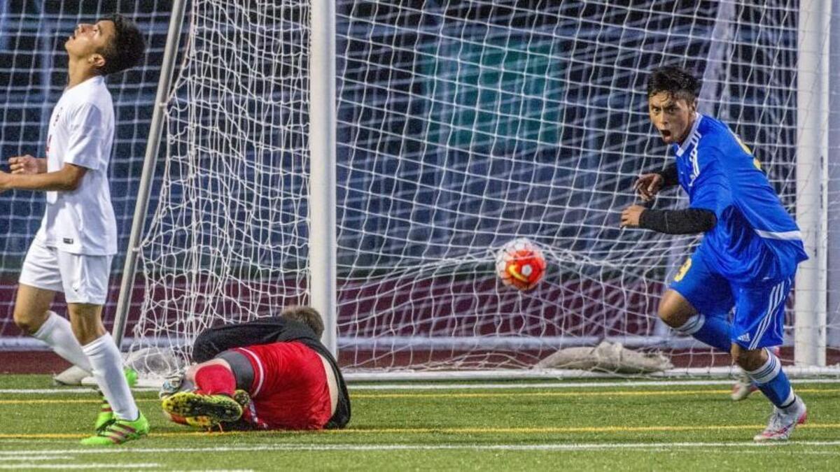 Bryan Flores of Fife High School complete his hat trick in a boys 2A soccer match at Franklin Pierce, April 22, 2016. Fife won 4-1.
