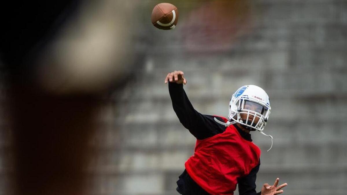 Quarterback Corry Sanders throws a pass during Stadium High School football practice at Stadium High School in Tacoma, Wash., on Thursday, Aug. 16, 2018. .
