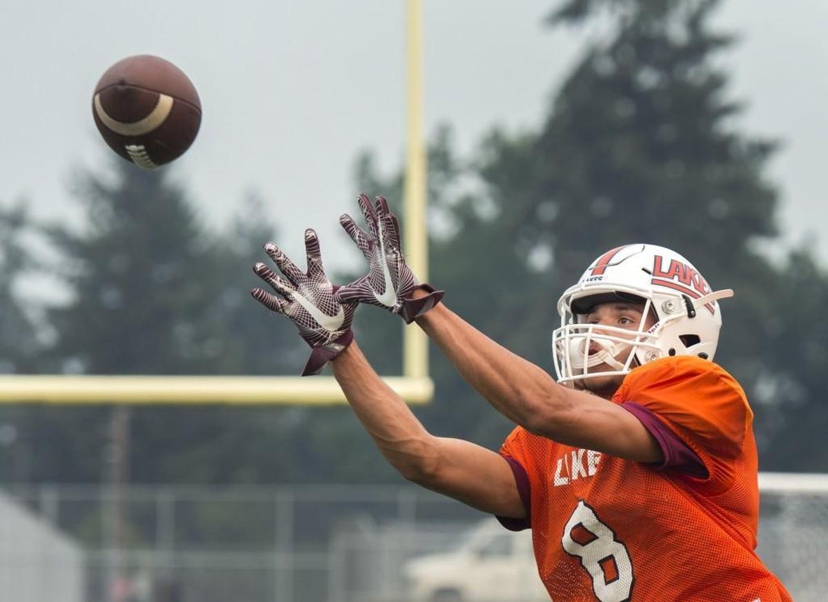 Lakes wide receiver Cody Roe hauls in a pass during a recent practice. Photo taken on Tuesday, Sept. 5, 2017.