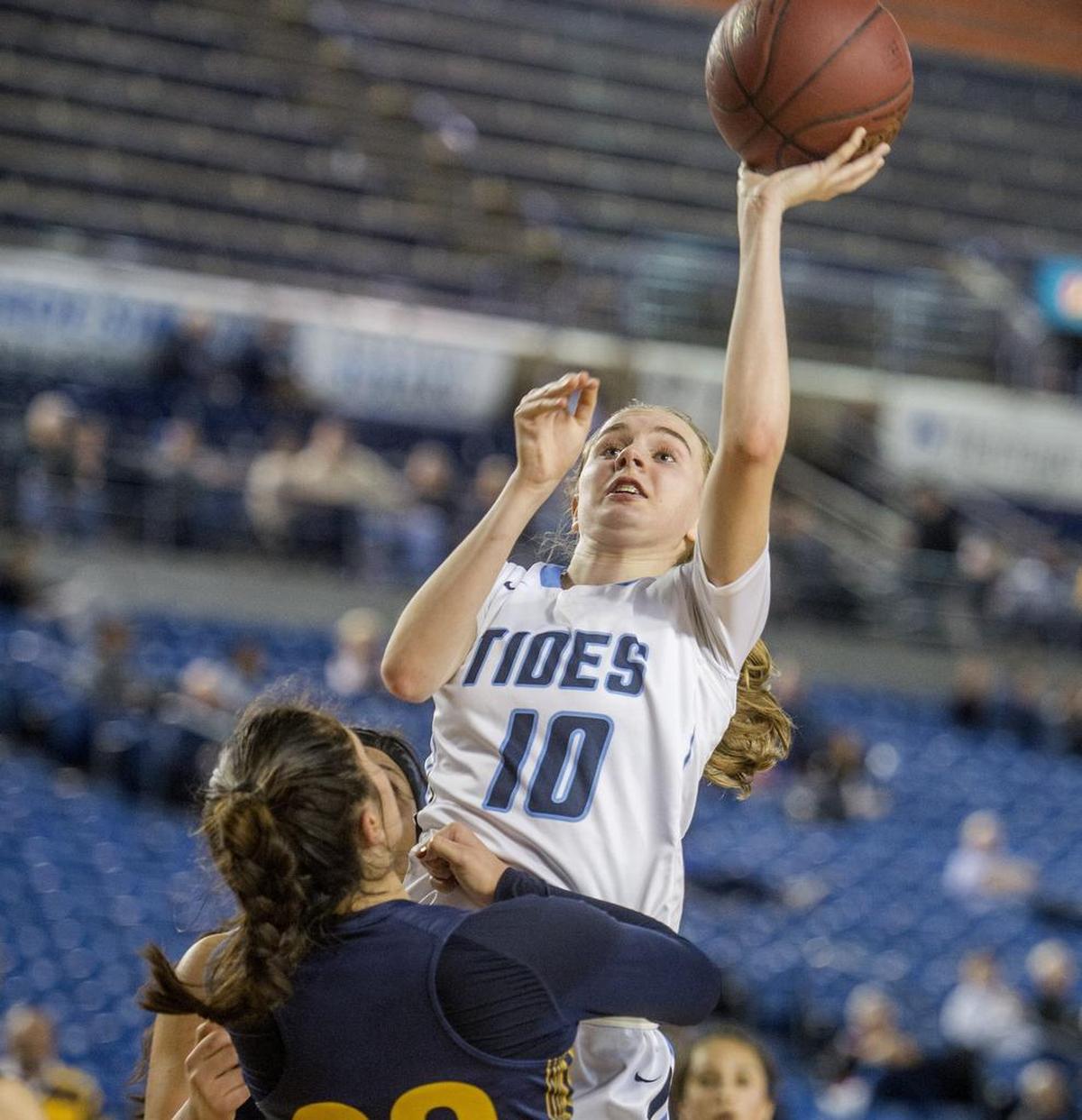 Brynna Maxwell of Gig Harbor High School takes a shot in the girls 3A semifinal basketball game of the state championships held in the Tacoma Dome, February 2, 2018. Gig Harbor beat West Seattle, 55-46.
