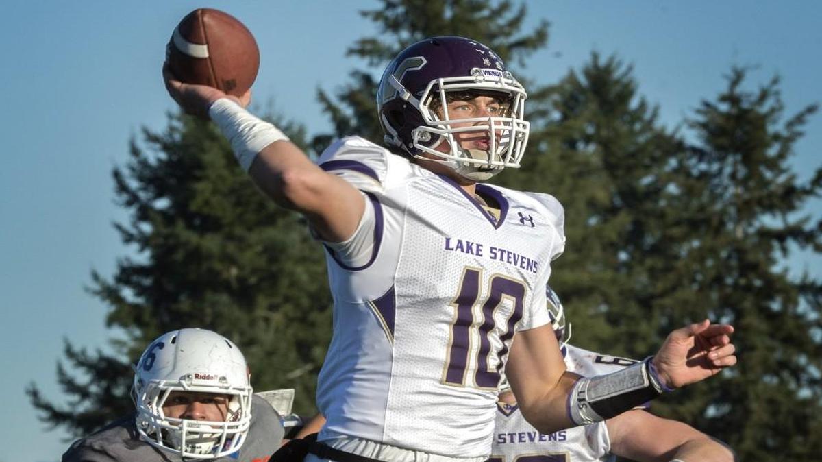 Lake Stevens quarterback Jacob Eason stands tall to complete a touchdown pass to his receiver at Art Crate Field in November.