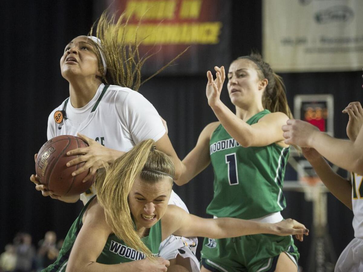 Kentridge’s Jaquaya Miller (44) puts up a shot in overtime. Kentridge played Woodinville in a basketball game during the Hardwood Classic state basketball tournament at the Tacoma Dome in Tacoma, Wash., on Thursday, March 1, 2018.