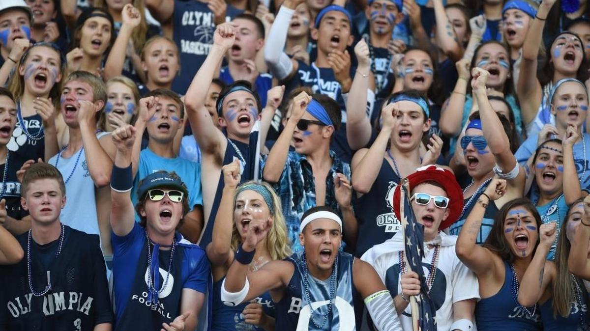 Olympia fans cheer on the Bears’ football team against Capital at Ingersoll Stadium in the Spaghetti Bowl last season.