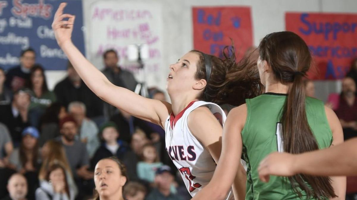 Black Hills junior Emma Duff slips down the lane against Tumwater. Duff averages 18 points and nine rebounds for the eighth-ranked Wolves.