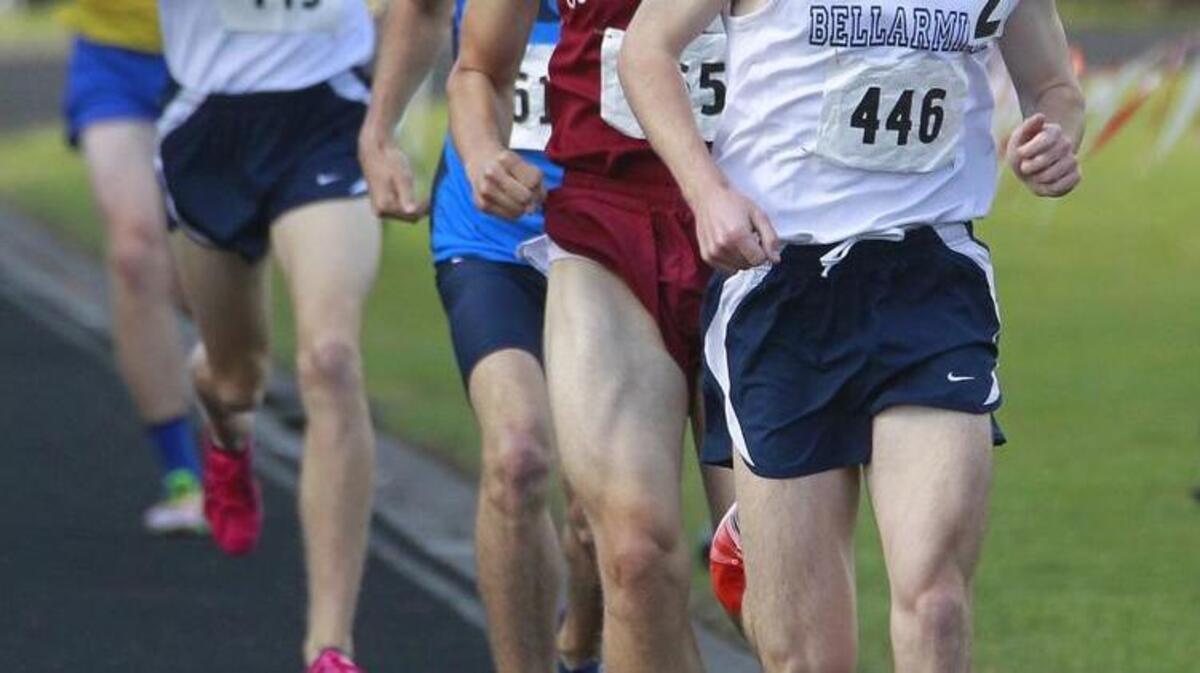 Bellarmine's Jack Yearian cuts the finish line for first in the1-mile run at the Narrows league track and field meet at Shelton High School May 14, 2015.