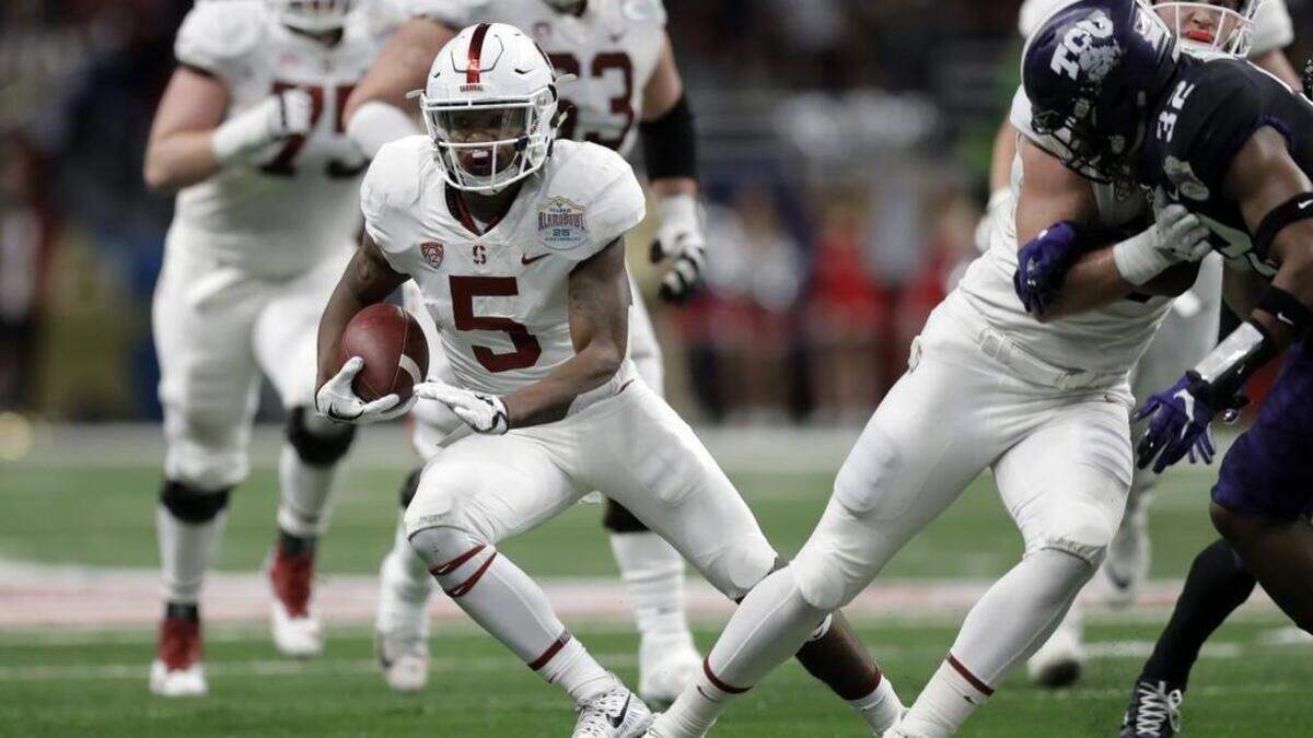 Stanford wide receiver Connor Wedington (5) runs against TCU after making a catch during the first half of the Alamo Bowl NCAA college football game, Thursday, Dec. 28, 2017, in San Antonio.