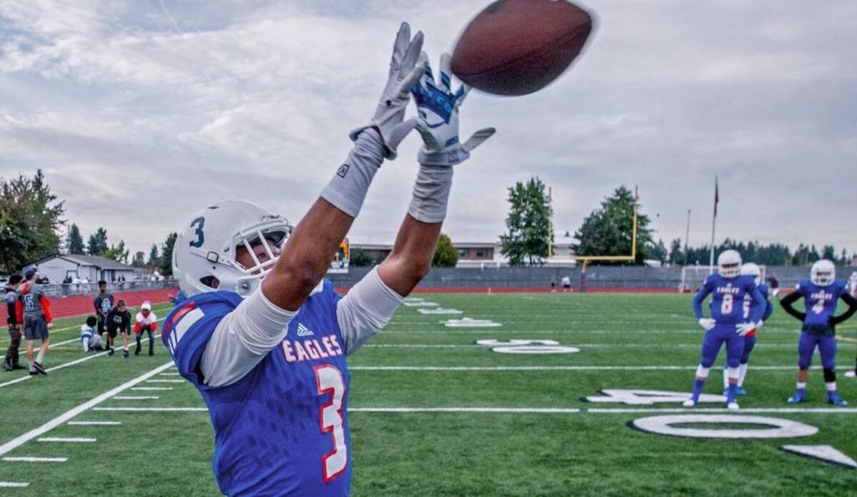 Wide receiver Tre Mason of Graham-Kapowsin warms up before a football game at Art Crate Field, September 22, 2017.