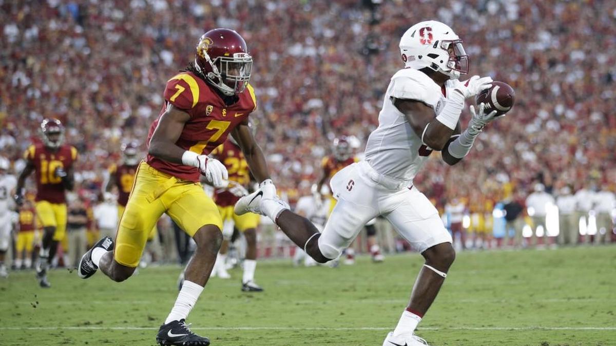 Stanford wide receiver Connor Wedington, right, makes a catch against Southern California safety Marvell Tell III during the first half of an NCAA college football game, Saturday, Sept. 9, 2017, in Los Angeles. (AP Photo/Jae C. Hong)