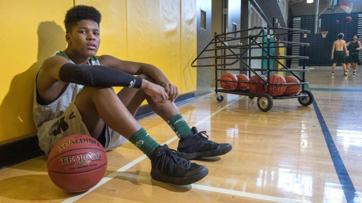 With two other players out with injuries, Auburn's Pa'Treon has stepped into the point guard role and helped the Trojans remain competitive in the 4A NPSL Olympic. Photo taken in Auburn on Monday, Jan. 16, 2017.