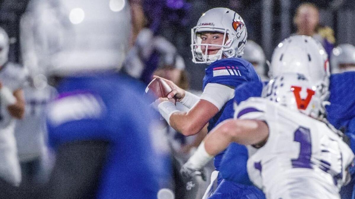 Quarterback Dylan Morris of Graham-Kapowsin in a football game against Sumner High School at Art Crate Field, September 22, 2017.