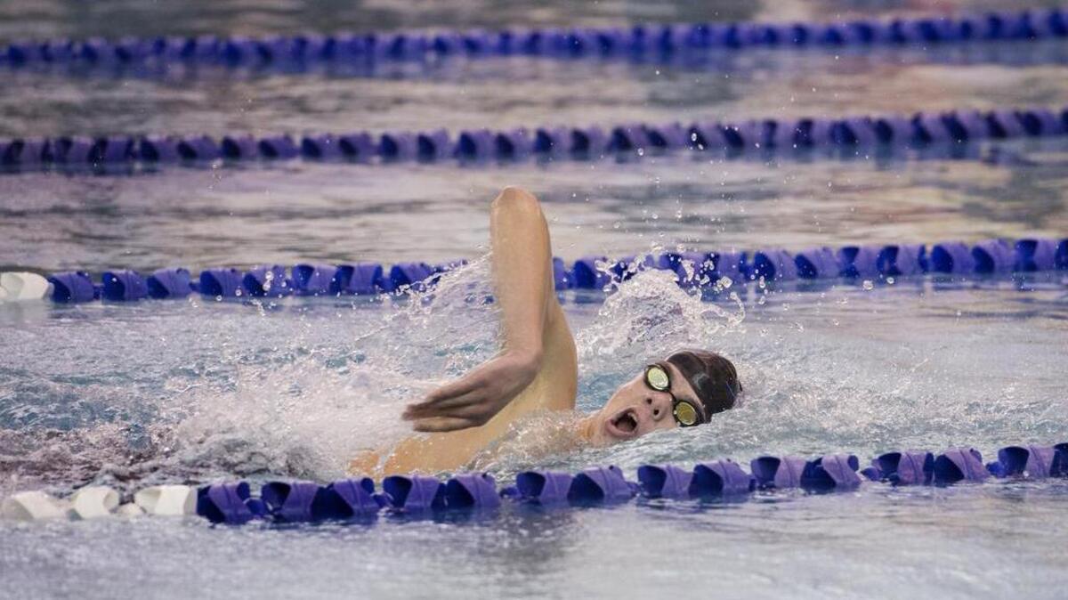 Without a competitor in sight, Gig Harbor’s Ryan Grady swims to an easy victory in the 500-yard freestyle. Grady, who also took first in the 200-yard freestyle, was the only swimmer to win two events at Saturday’s district meet.