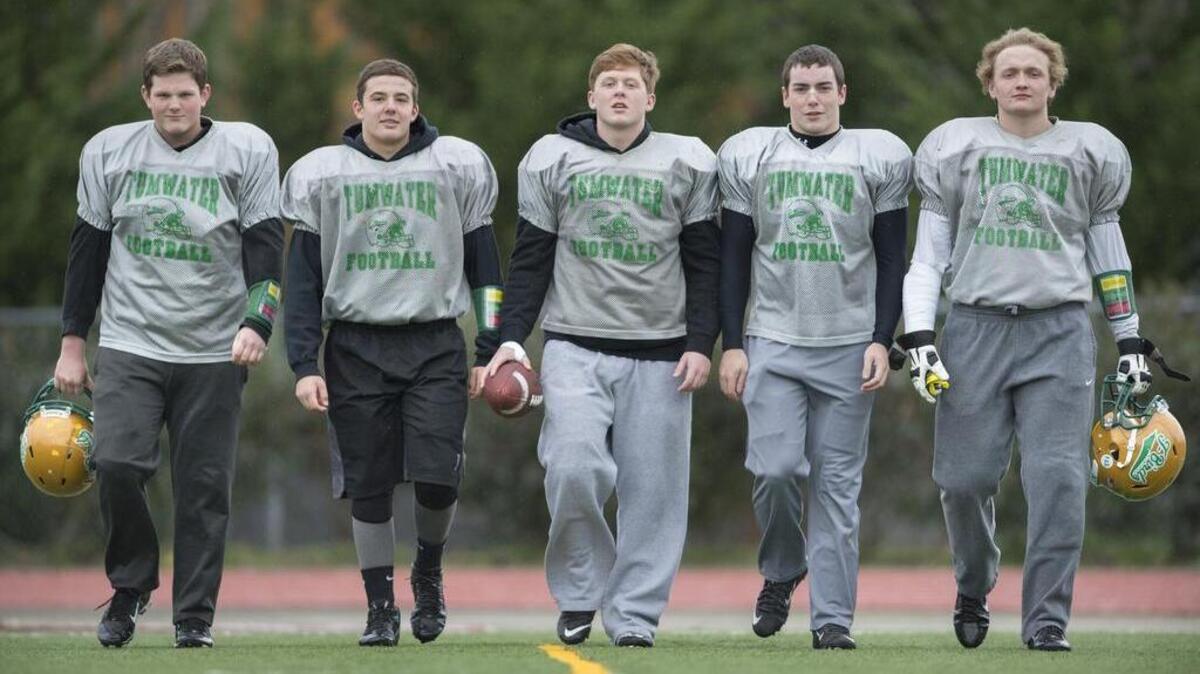 Tumwater’s offensive linemen, from left, senior tackle Bailey Snow, junior guard Adam Warren, senior center Tommy Brassfield, junior guard Jayson Haury and senior tackle Brin Hanson are known as a close-knit group. “They’re five-as-one,” head coach Sid Otton says. “They take a lot of pride in their work.”