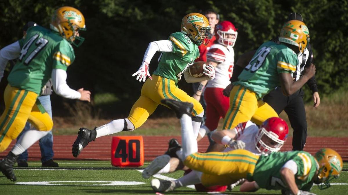 Tumwater defensive back De-Juan Freeman heads up field after intercepting a Prosser pass during Saturday afternoon’s 2A football state playoff game at Tumwater District Stadium on Nov. 10, 2018. The interception set up the game-winning touchdown run by teammate Hunter Baker.