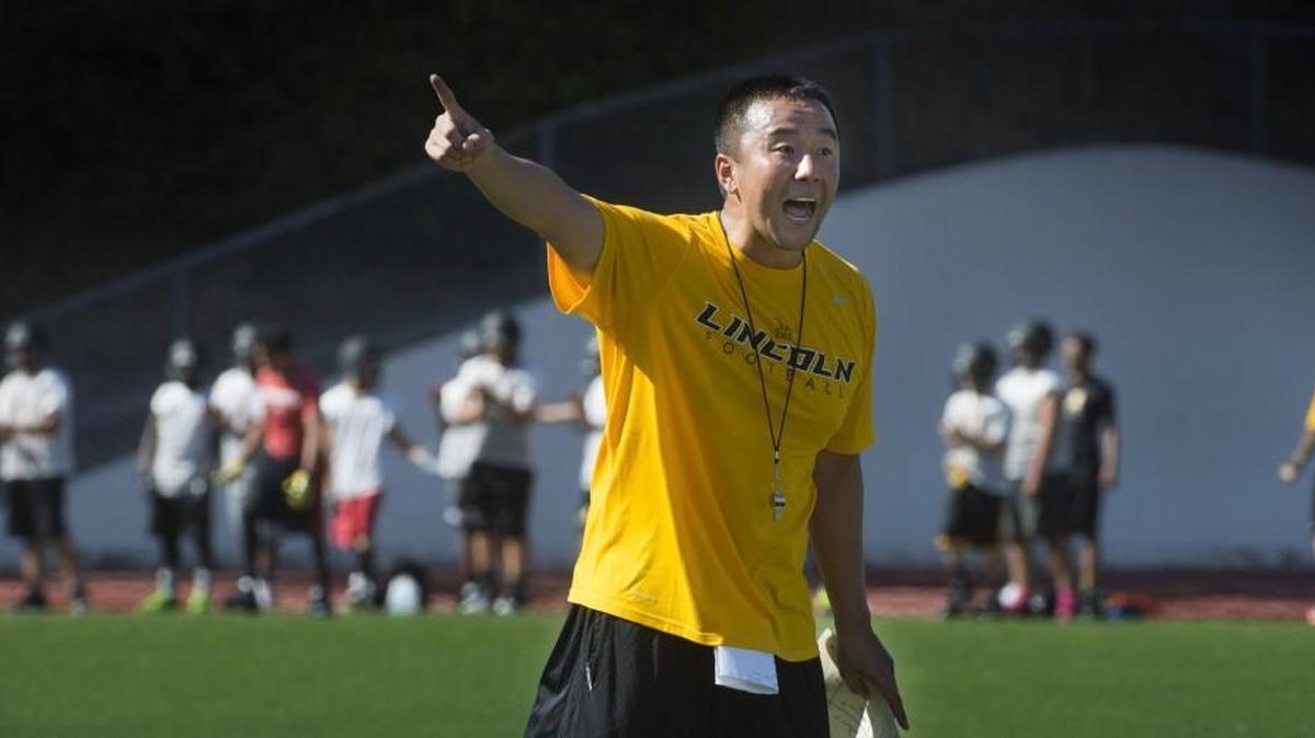 
First-year Lincoln High football coach Masaki Matsumoto gets his message through to his players with the use of emotional letters of love written by the players’ parents.
