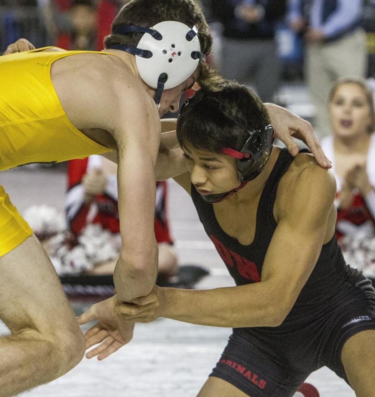Orting's Alex Cruz competes against Burlington Edison's Ty Peth in the 2A boys 126 pound championship match at Mat Classic XXIX at the Tacoma Dome. Cruz on Tuesday became the first wrestler in Orting’s history to reach the finals of the Fargo Junior Nationals in North Dakota.