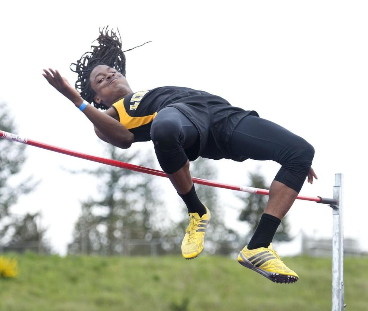 Lincoln's Mykel Campbell misses at a height of 6-3, but won the high jump by clearing six feet. Photo taken in Federal Way on Saturday, April 29, 2017.