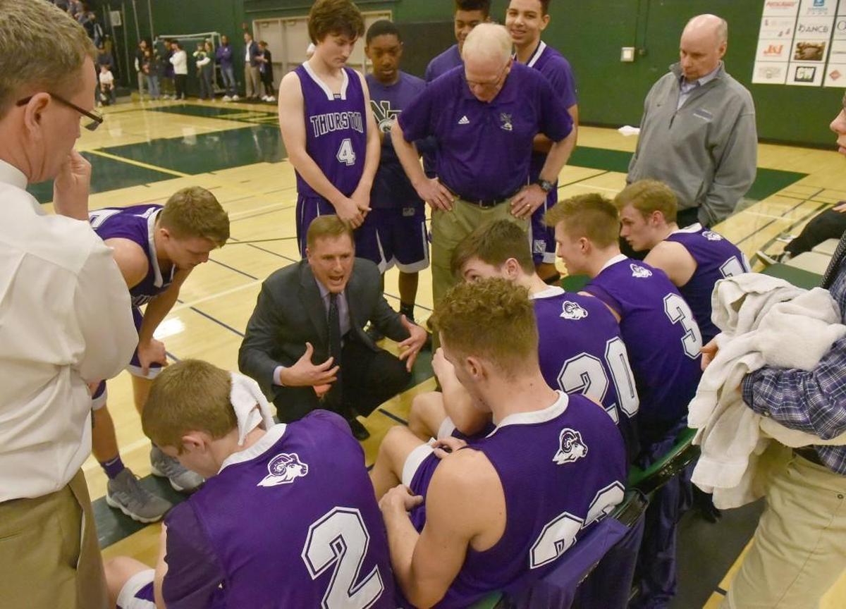 Rams' head coach Tim Brown gets his team ready for the start of the 4th quarter against Timberline Wed. Jan. 24th.