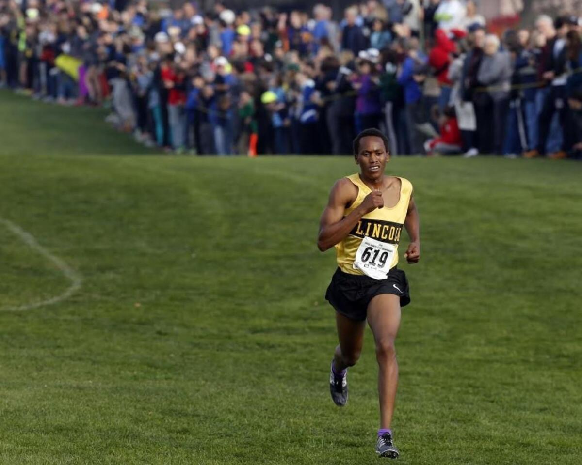 Lincoln High School's James Mwaura leaves the rest of the pack in the dust as he approaches the finish line in the boys 3A race on November 5, 2016 during the WIAA Cross Country Championships at Sun Willows Golf Course in Pasco. Mwaura is ranked as the fifth-best cross country runner in the nation by DyeStat.
