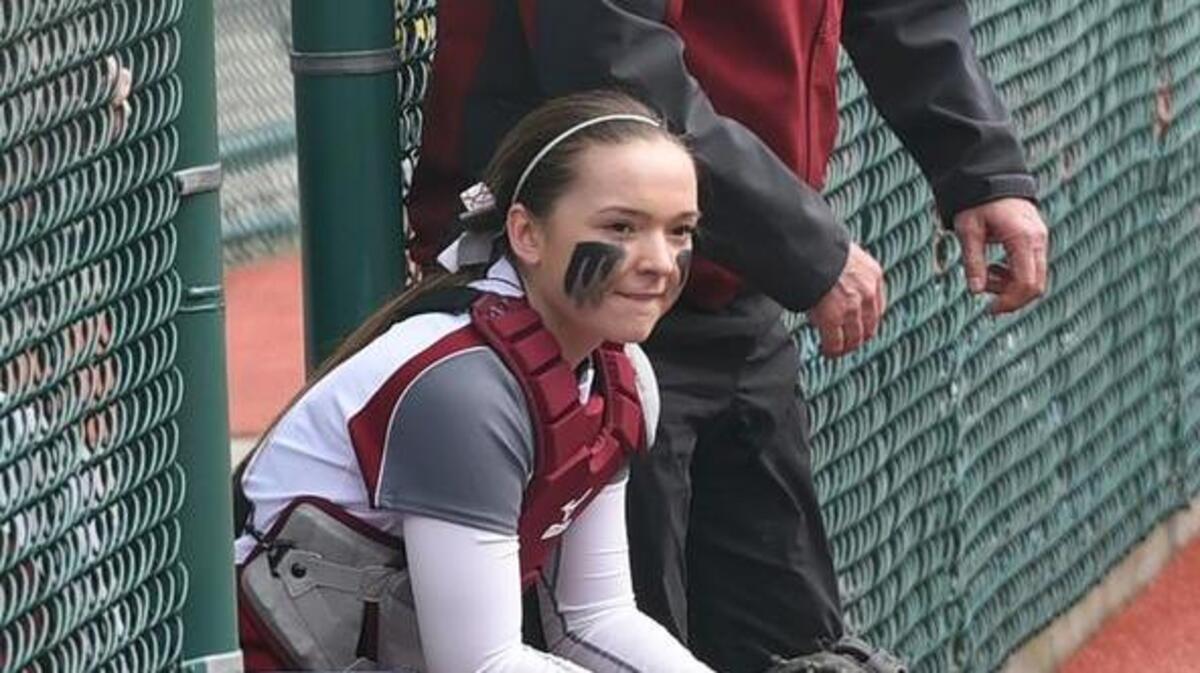 W.F. West catcher Kindra Davis, left, and head coach Mike Keen watch their team play North Thurston on Monday. Davis is one of three sophomore starters for the Bearcats this season.