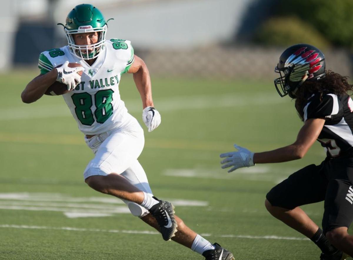 East Valley's Rodrick Fisher (88) runs the ball against North Central during a high school football game on Friday, September 1, 2017, at Joe Albi in Spokane, Wash.
