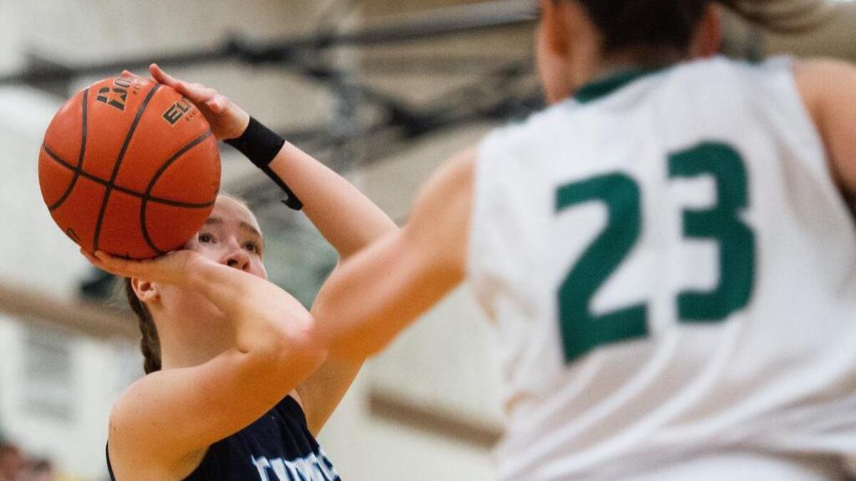 Gig Harbor’s Tate McReynolds (2) shoots in the first quarter. Peninsula played Gig Harbor in a basketball game at Peninsula High School in Purdy, Wash., on Thursday, Jan. 31, 2019.