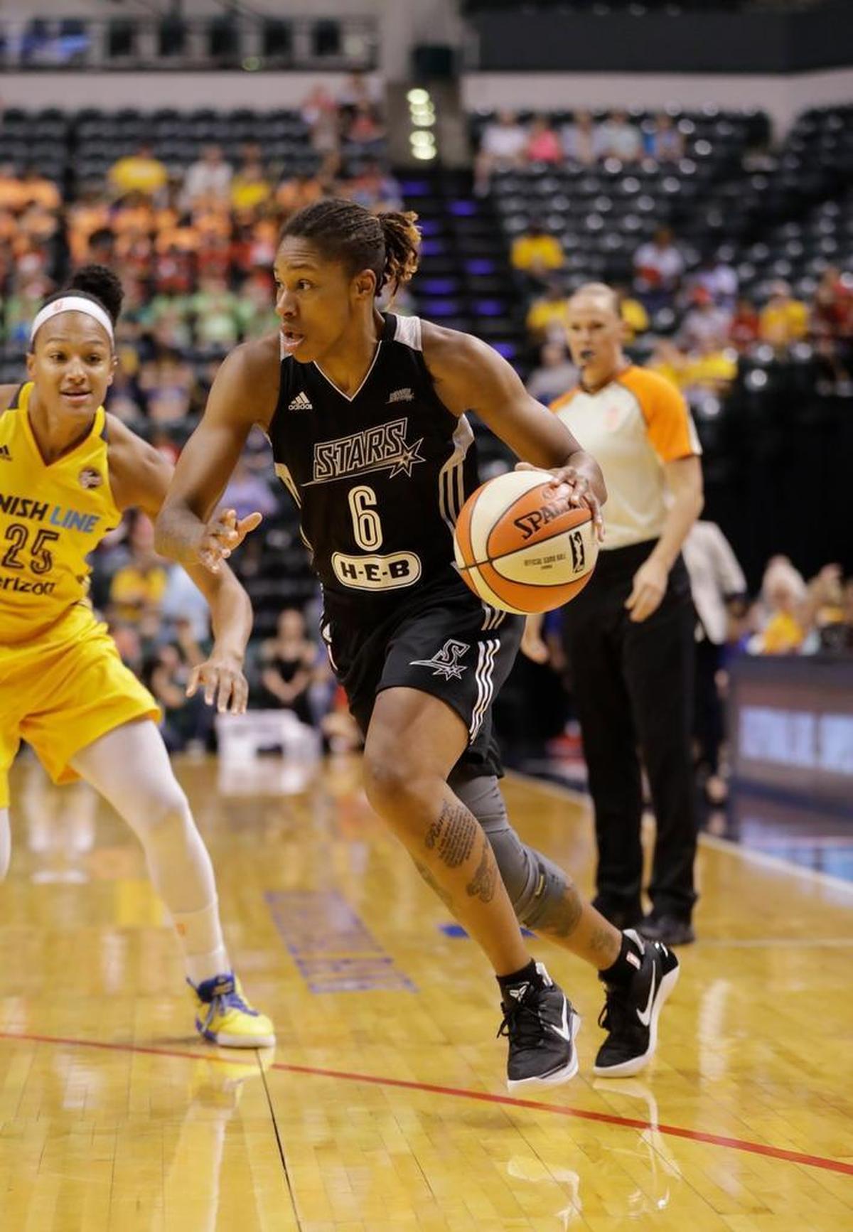 San Antonio Stars' Alex Montgomery (6) goes to the basket during the first half of a WNBA basketball game against the Indiana Fever, Wednesday, July 12, 2017, in Indianapolis. (AP Photo/Darron Cummings)