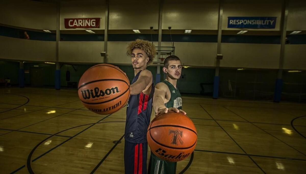 Timberline boys basketball player Erik Stevenson, right, and Wilson’s Emmitt Matthews Jr. both played on the same AAU basketball team this offseason and enter their senior seasons as two of the most recruited players in a long time from the South Sound. Stevenson is committed to Wichita State, one of the top-ranked college teams in the country, and Matthews to UConn, which has won four national championships. But they are also good friends, though also competitors.