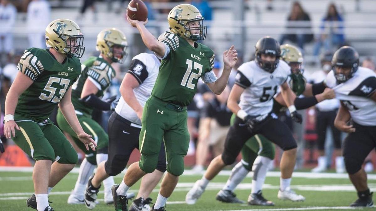 Timberline quarterback Garrett Warrington and the Blazers are undefeated and ranked No. 7 in the 3A division.