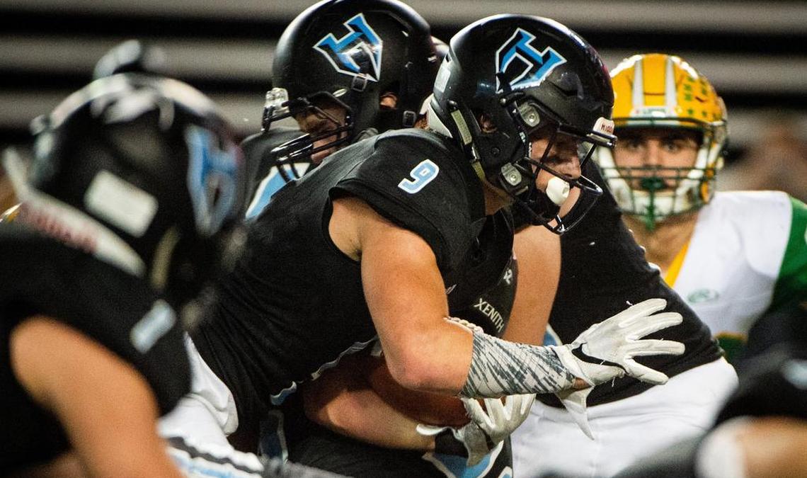 Hockinson’s Sawyer Racanelli (9) rushes in the final minutes of the fourth quarter. Hockinson played Lynden in the WIAA 2A football state championship game at the Tacoma Dome in Tacoma, Wash., on Saturday, Dec. 1, 2018.