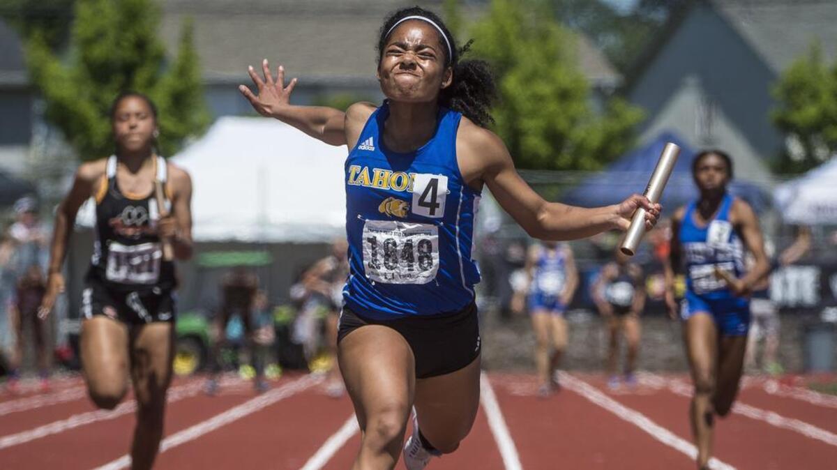 Tahoma’s Aliya Wilson finishes the 4A girls 4x100 event at the Track and Field Championships at Mount Tahoma High School in Tacoma, Wash., on Saturday, May 27, 2017.