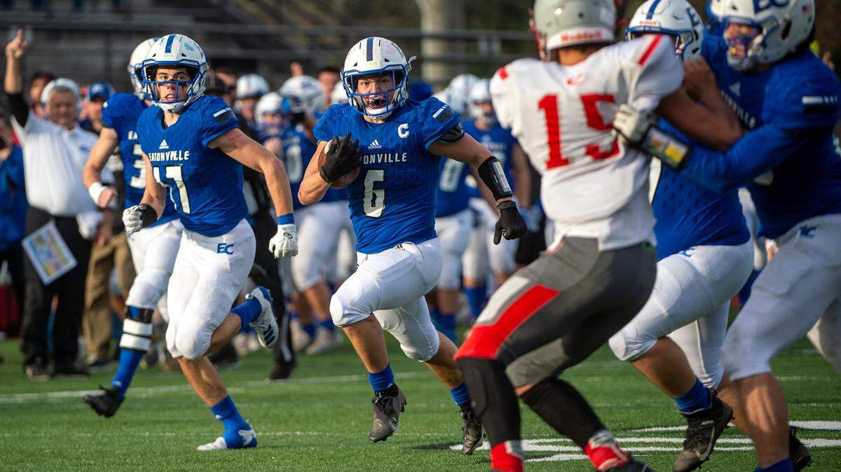 After intercepting a pass, Eatonville linebacker Blain Hanly runs the ball back for a touchdown during the fourth quarter of a State 1A quarterfinal game against Riverside on Saturday afternoon at Art Crate Field in Spanaway.