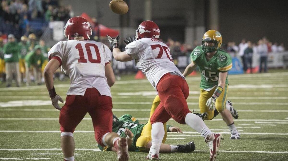 Prosser’s Riley Lusk (70) chases down a Tumwater fumble deep in Mustangs’ territory in the final minute of Saturday’s title game.