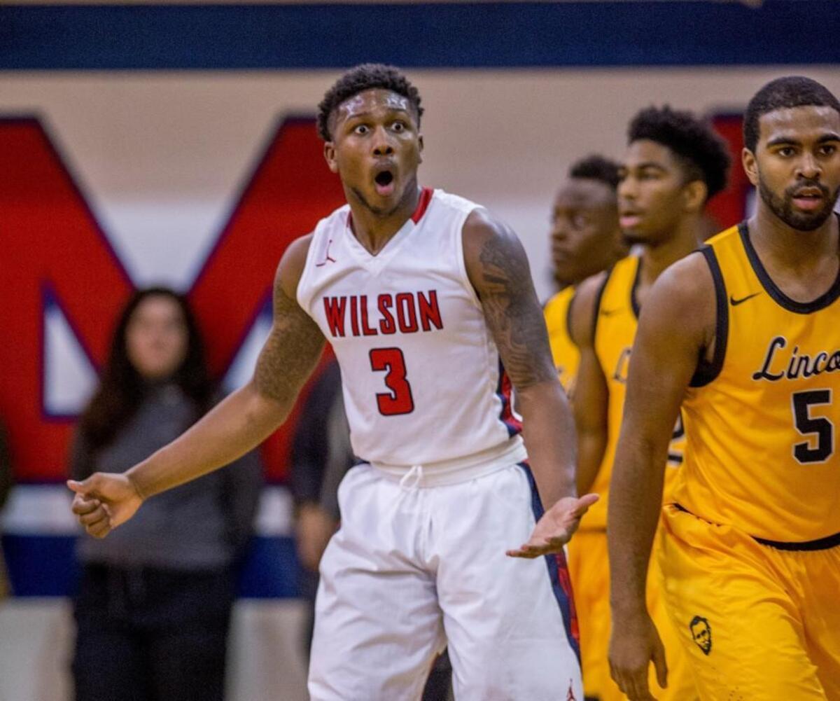 David Jenkins, Jr. of Wilson doesn't think he deserved the offensive foul call in a 4A Narrows League boys basketball game at Wilson, January 6, 2016. Lincoln beat Wilson 73-59.